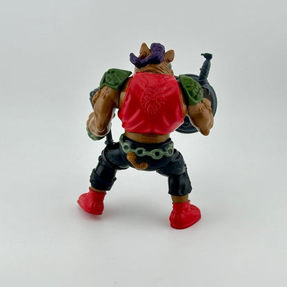Anthropomorphic hog in pants, vest,  with nosering & armor, holding gun, knife & sewer lid shield. Back.