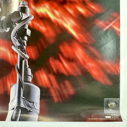 Bottom right corner of poster with copyright information and some edge wear. 