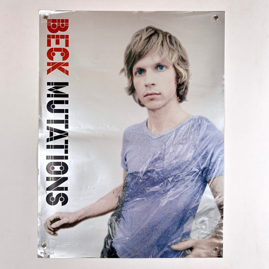 Poster of Beck "Mutations" album cover with artist pictured on silver background. 