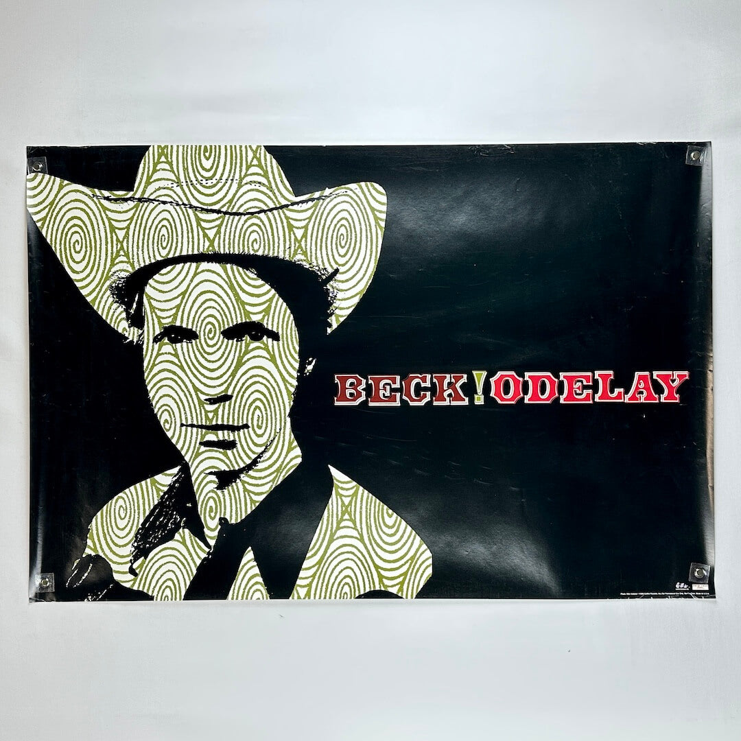 Black promo poster with stylized portrait of Beck to left of album and artist name. 