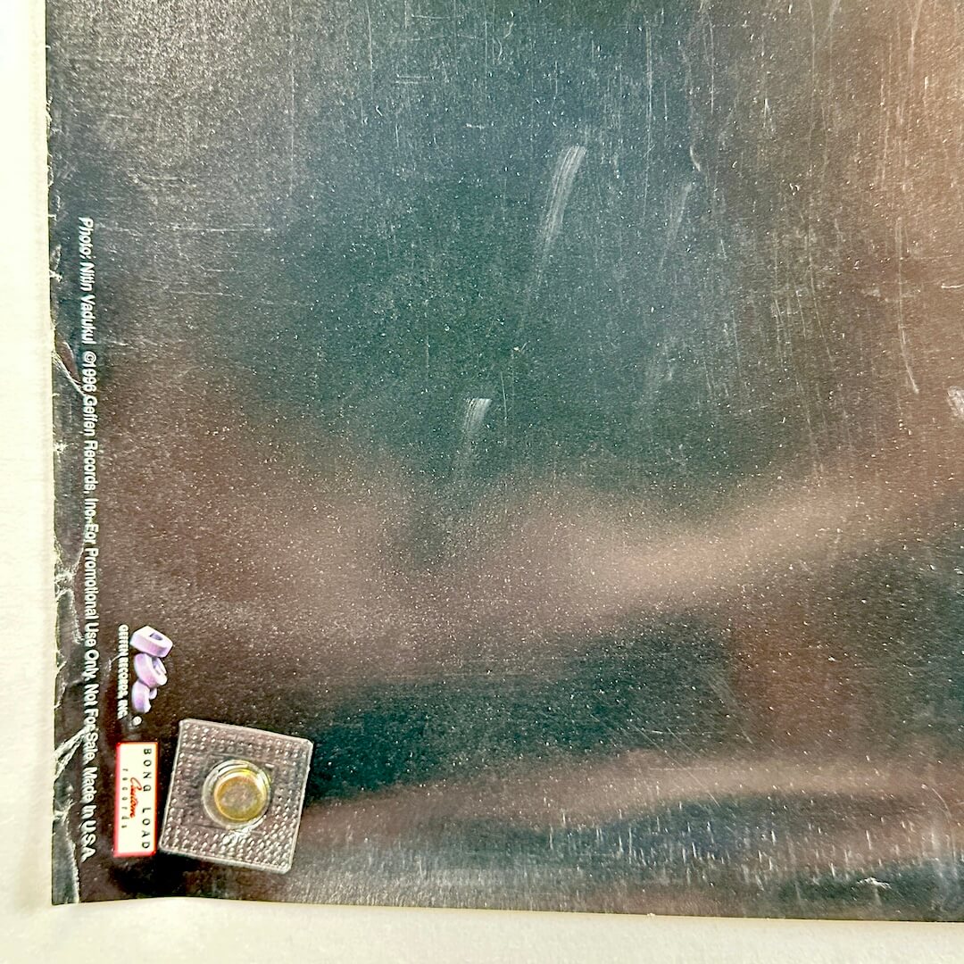 Bottom right corner with copyright information and some edge wear. 