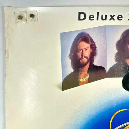 Top left corner with extreme edge wear along side. 