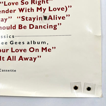 Bottom right corner of poster with half inch tear five inches above corner. 