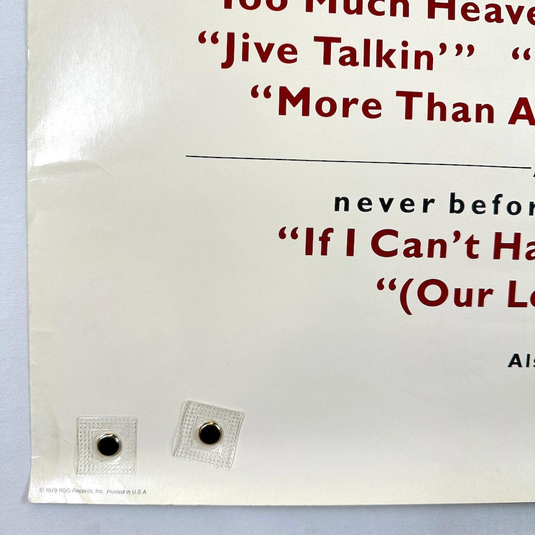 Bottom left corner with some damage to corner and crease along edge. 