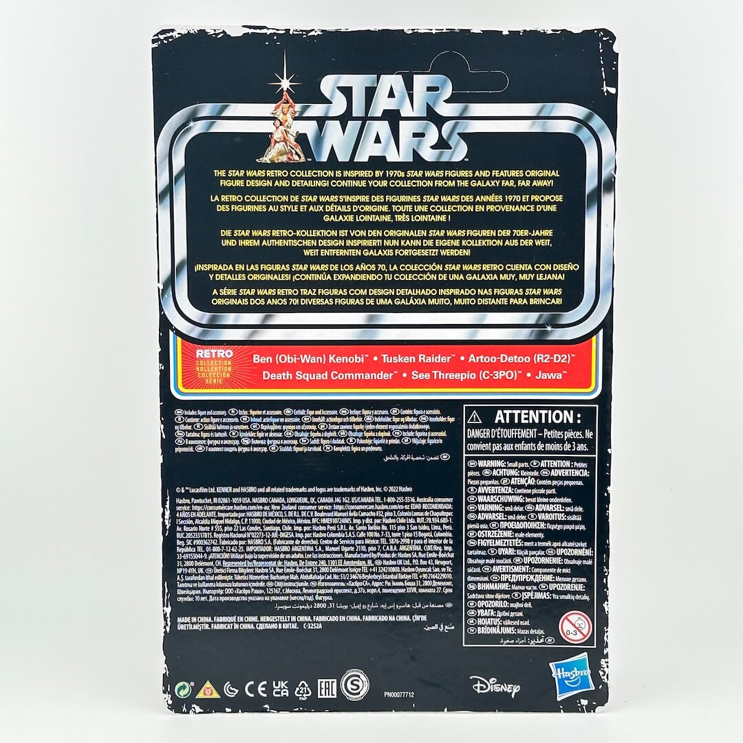 The back of a Star Wars Retro Star figure packaging card, showing product details, and warning labels.