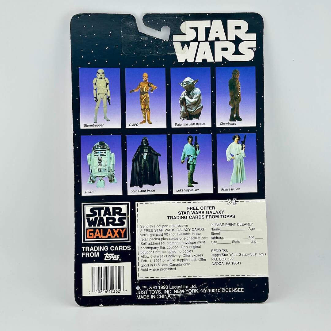 Vintage Star Wars action figure packaging with character illustrations on a white background