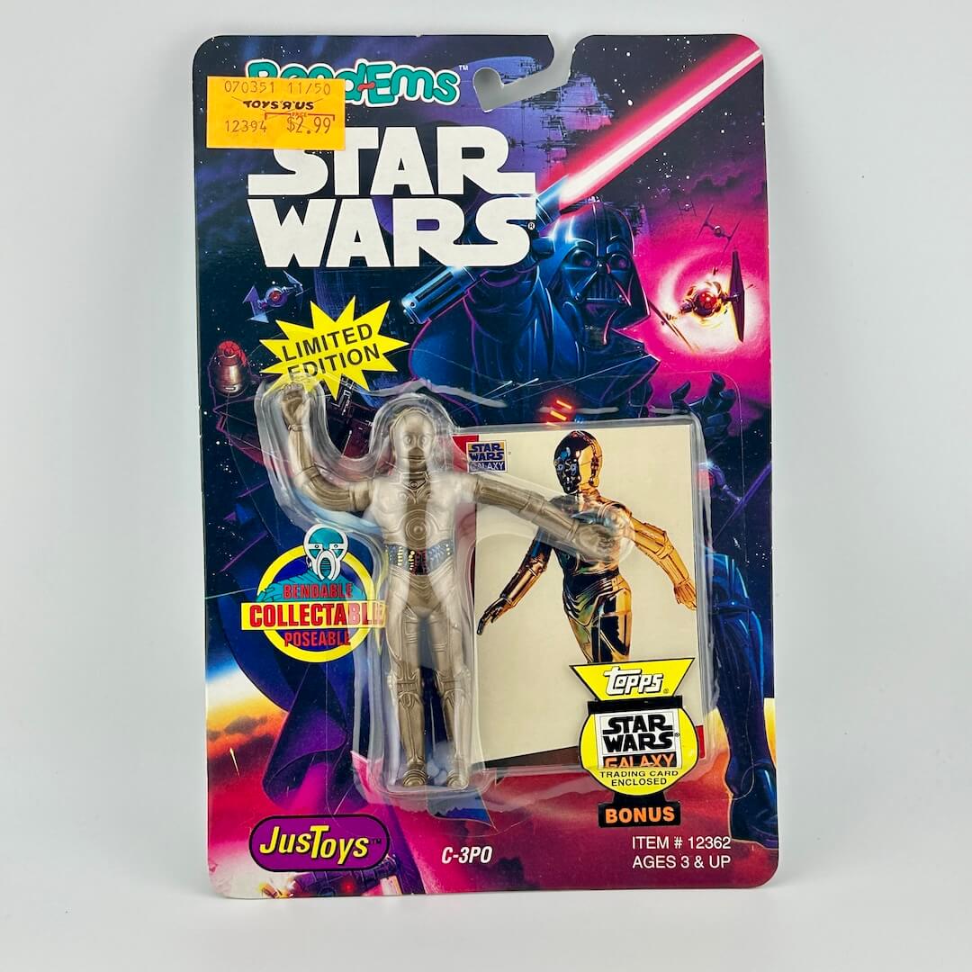Star Wars C-3PO action figure in packaging with colorful background