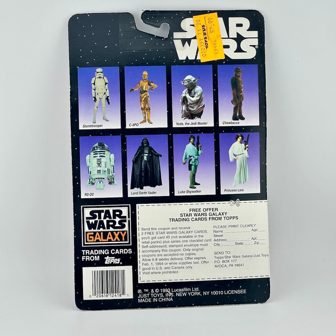 Vintage Star Wars action figure packaging with character illustrations on a white background