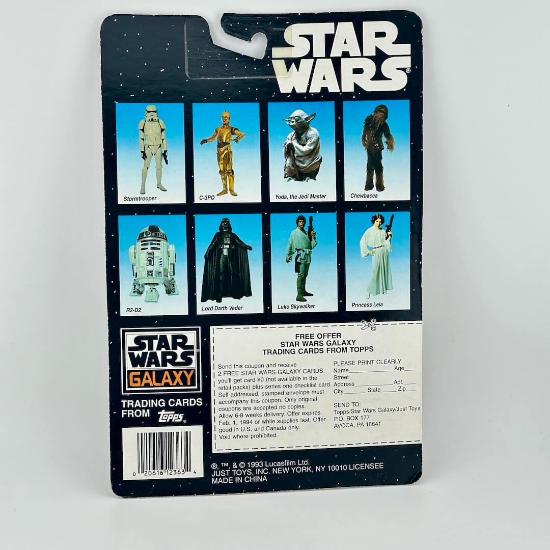 Vintage Star Wars action figure packaging with character illustrations on a white background
