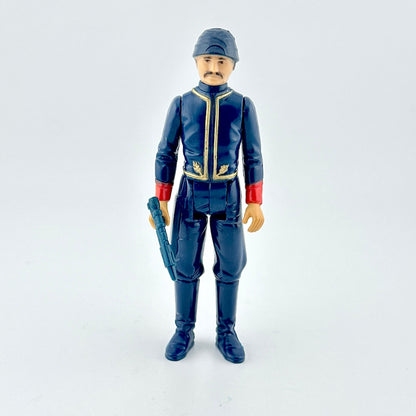 Action figure in blue suit with red and gold accents with weapon on white background. 