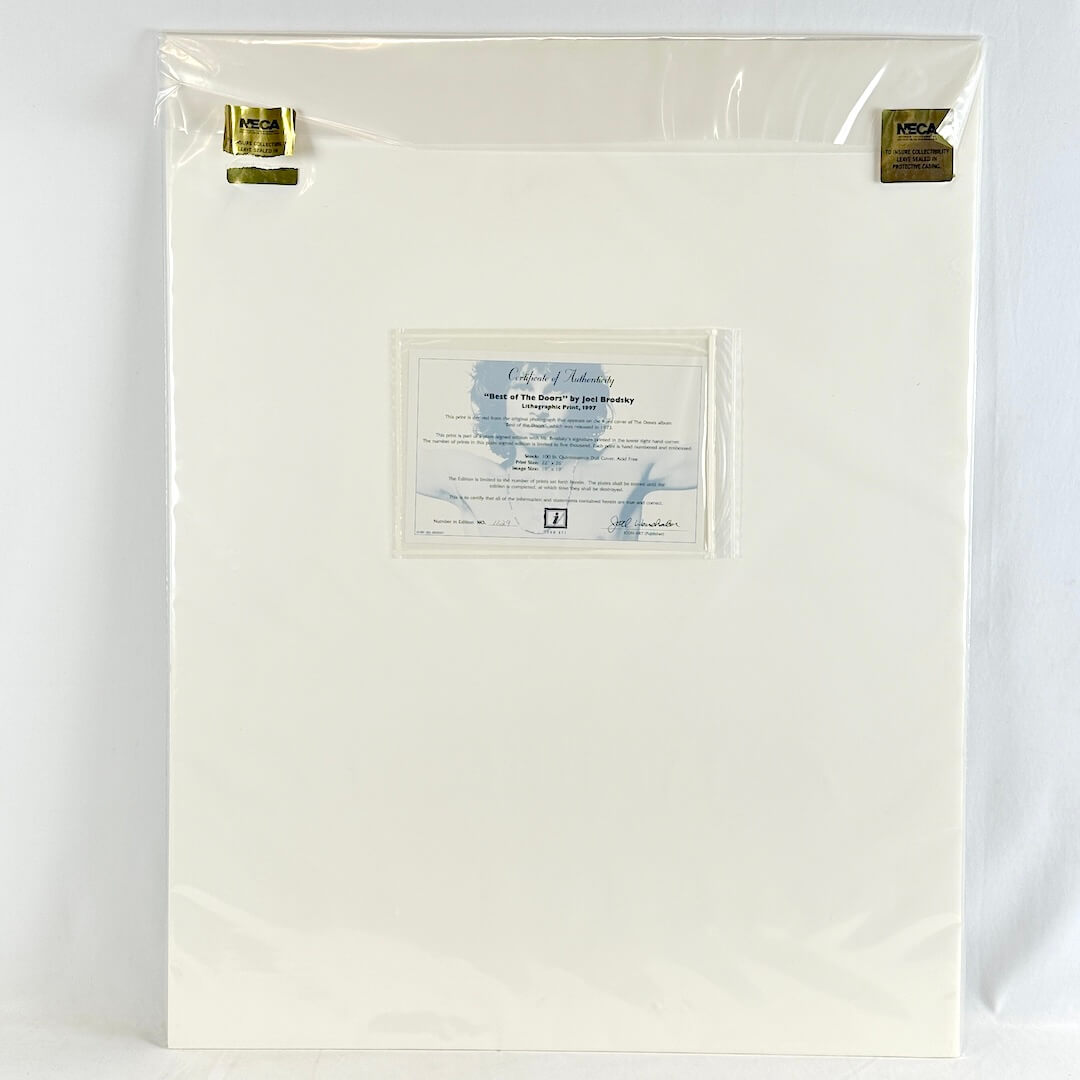 Backside of print with certificate and two golden sticker steals. 