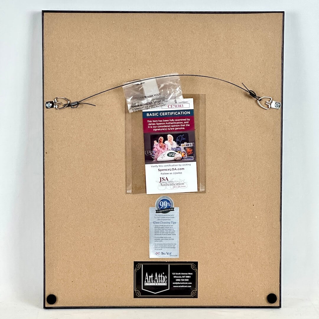 Backside of frame to show frame shop information, care information, and authentication certification. 