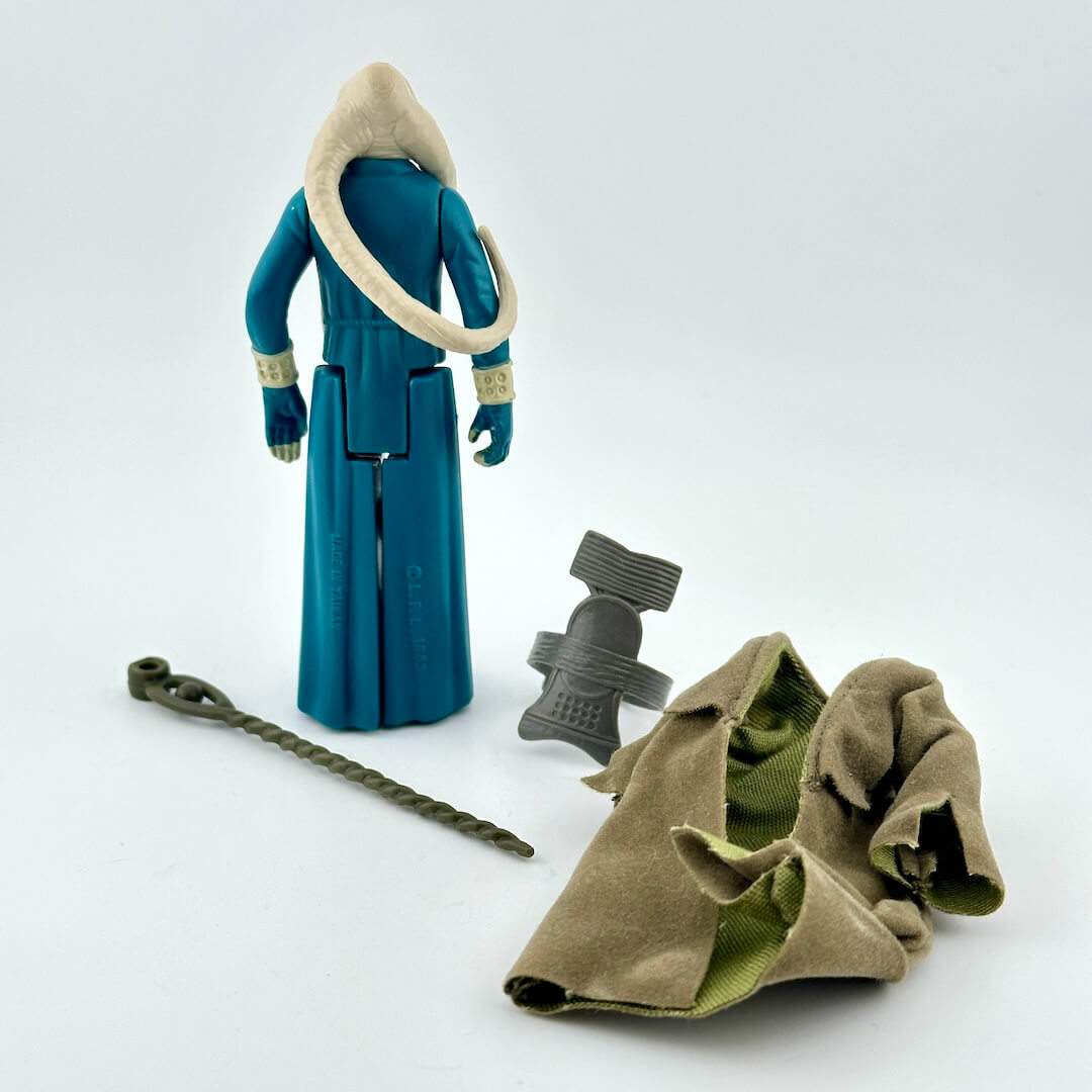 Action figure with accessories on a white background