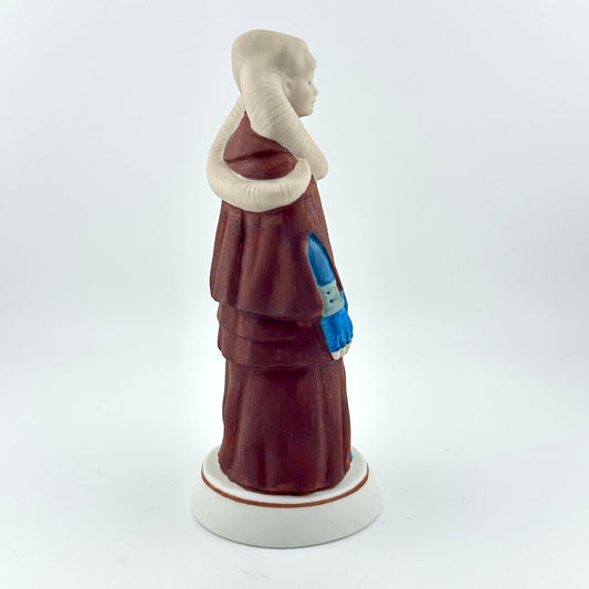 Star Wars figurine with tag on white background. 