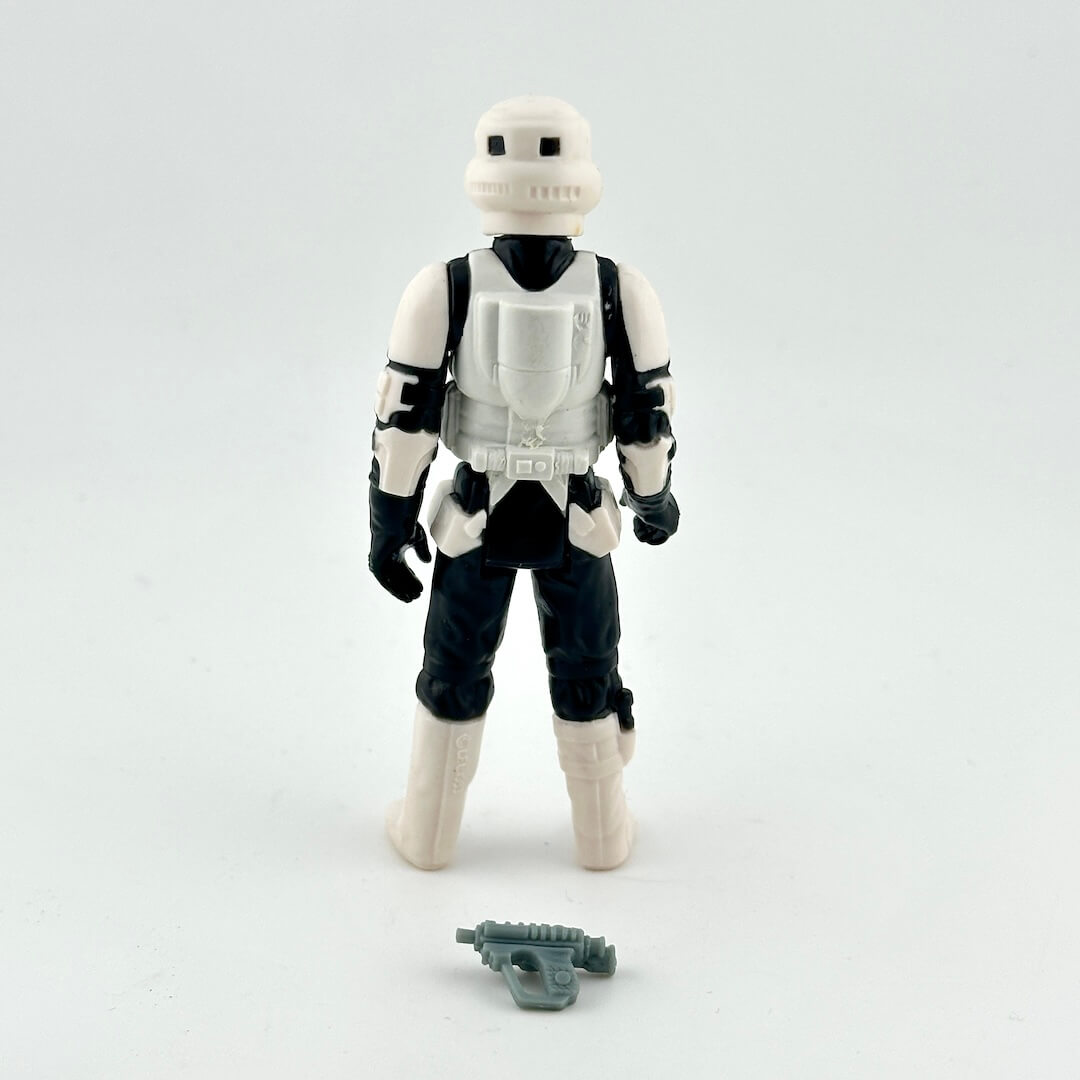 Toy figure of a stormtrooper from Star Wars on a light gray background