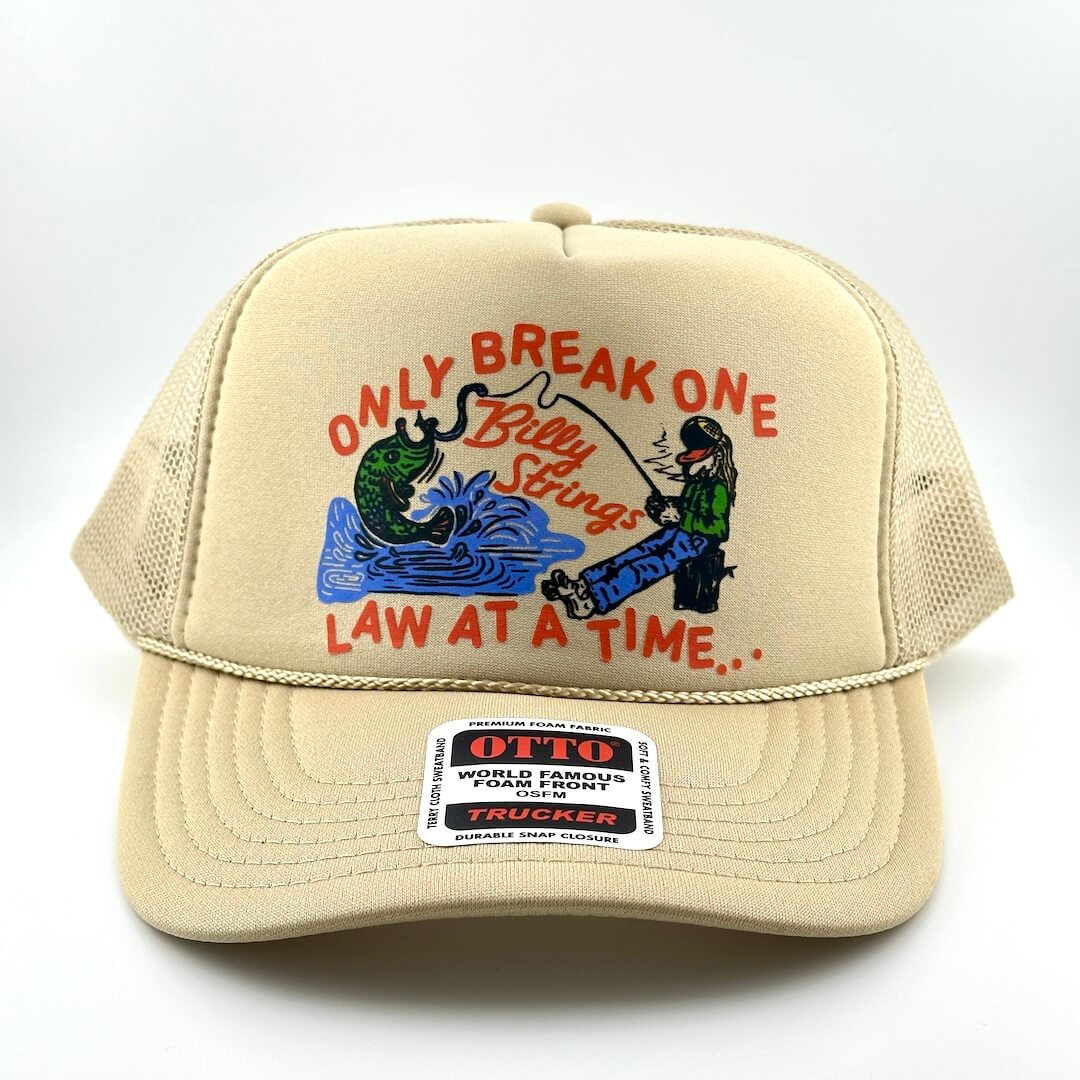 Beige trucker hat with graphic design and 'OTTO' label on a white background
