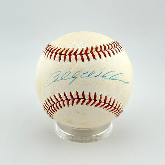 Baseball with autograph on a white background