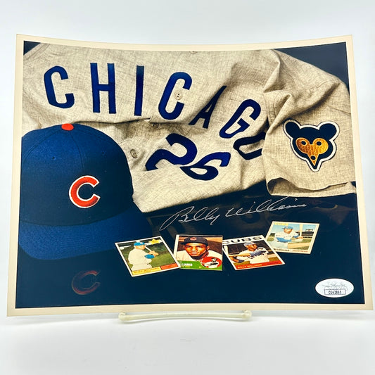 Photograph of memorabilia collage featuring signature of player, JSA authentication sticker in corner. 