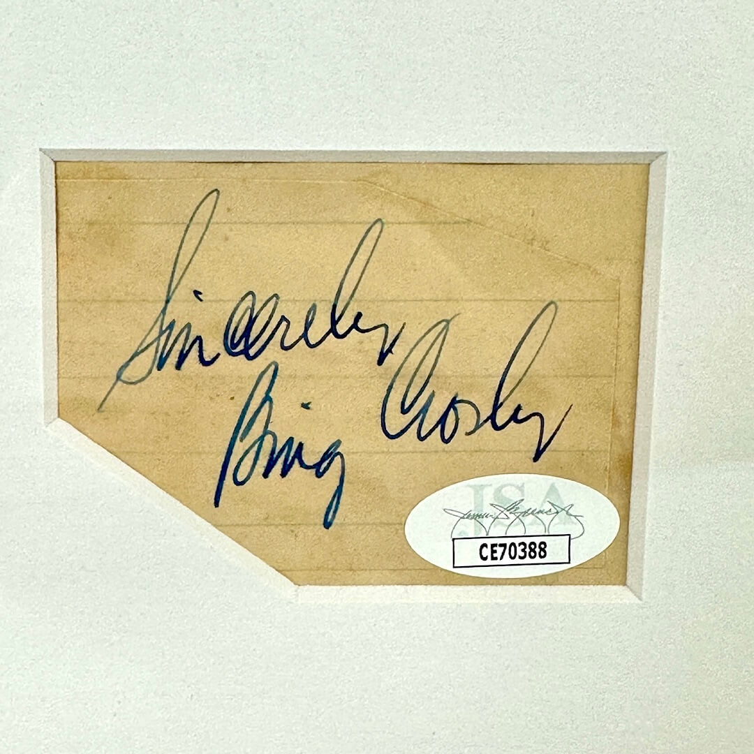 Matted autographed slip of paper with authentication sticker. 