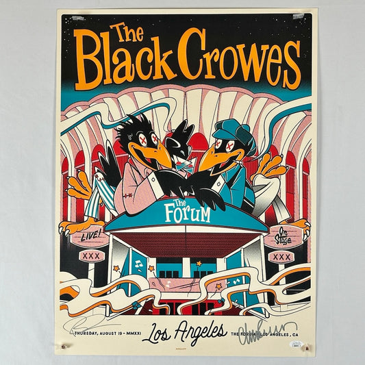 Two crows with drinks in front of the LA forum with band lettering on top and signatures on bottom. 