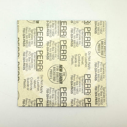Backside of patch showing intact paper backing and mitn condition. 