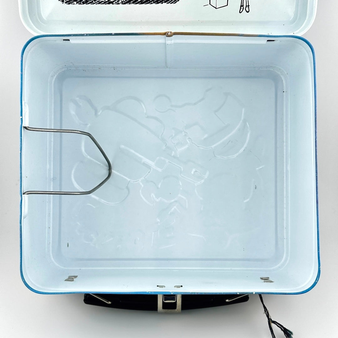 Top-down view of interior of metal lunchbox, showing white interior with no rust or wear. 