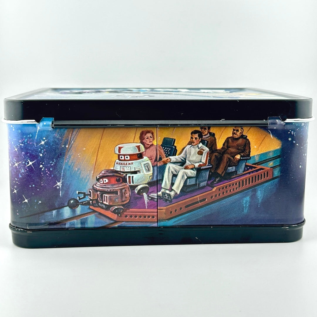 A rectangular metal tin with a hinged lid, featuring a colorful retro sci-fi illustration of characters on a space-themed background.