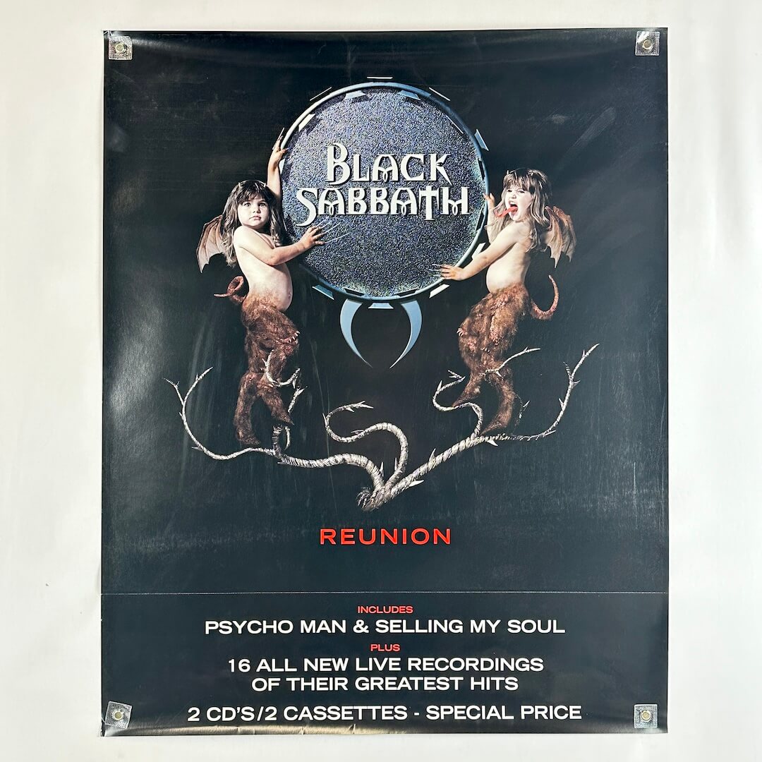 Black Sabbath reunion album cover with two cherubs and a dark background