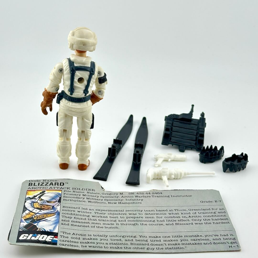 Toy figure of a Blizzard Arctic Attack Soldier with accessories on a white background