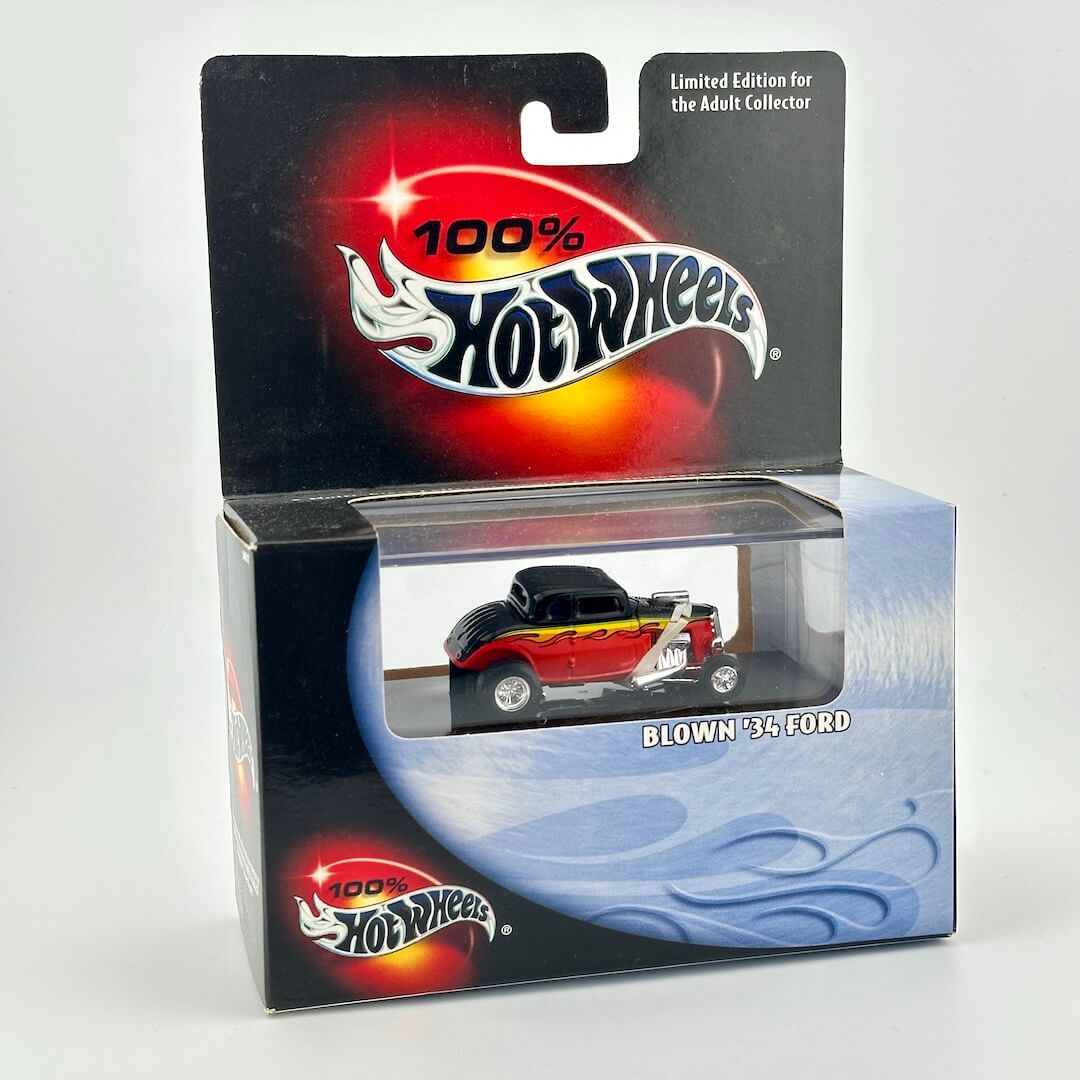 A Hot Wheels diecast toy car in its original blister packaging, featuring a 1934 Ford 'Blown' model car.