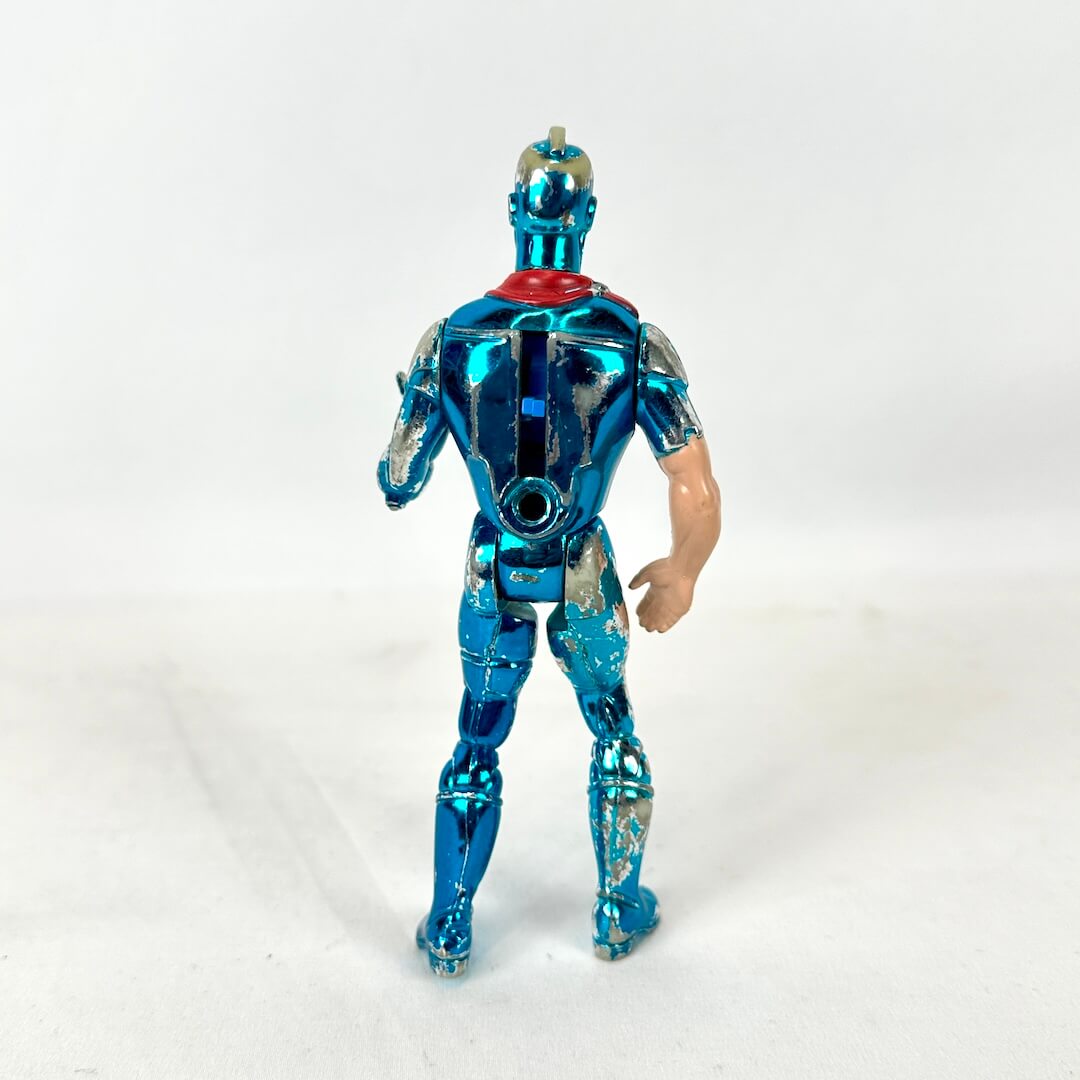 A metallic blue action figure shown from the back on a plain white background.