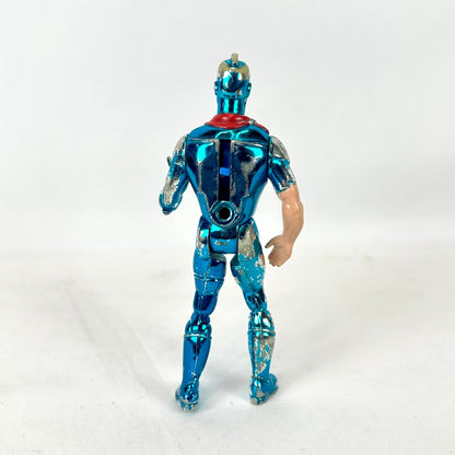 A metallic blue action figure shown from the back on a plain white background.