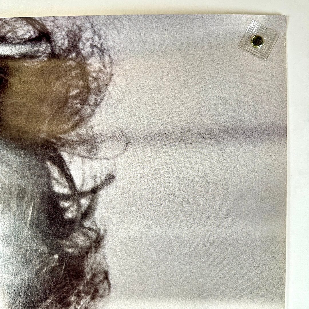 top right corner of poster with some wear 
