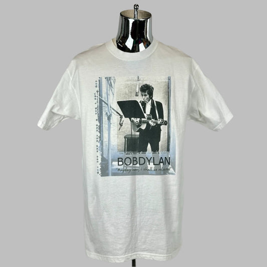 Front of white t-shirt with black/white image of Dylan in recording studio with name in black text below it. 