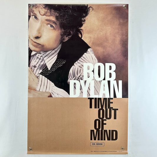 Poster of Bob Dylan with text 'Bob Dylan Time Out of Mind' on a plain background