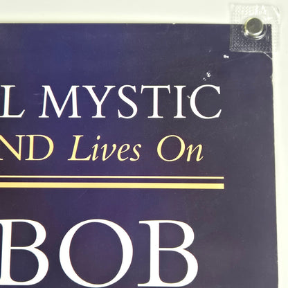 Top right corner of poster with pin holes