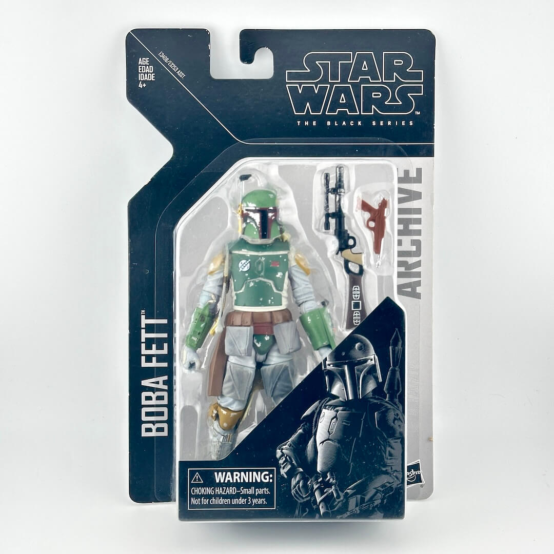 Star Wars Black Series Archive Boba Fett action figure in original window packaging showing figure with accessories. 