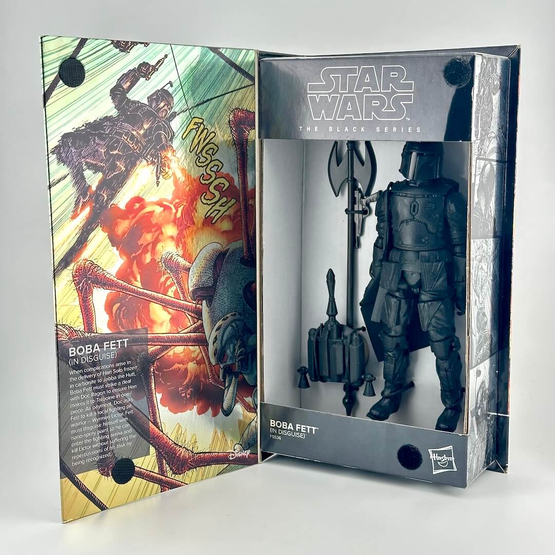 Boba Fett action figure in its original illustrated window box packaging, shown open to display the figure and comic-style artwork.