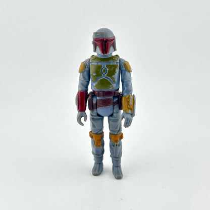 Action figure with a gray and green costume on a white background