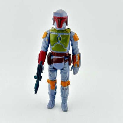 Action figure in battle armor with weapon on white background. 