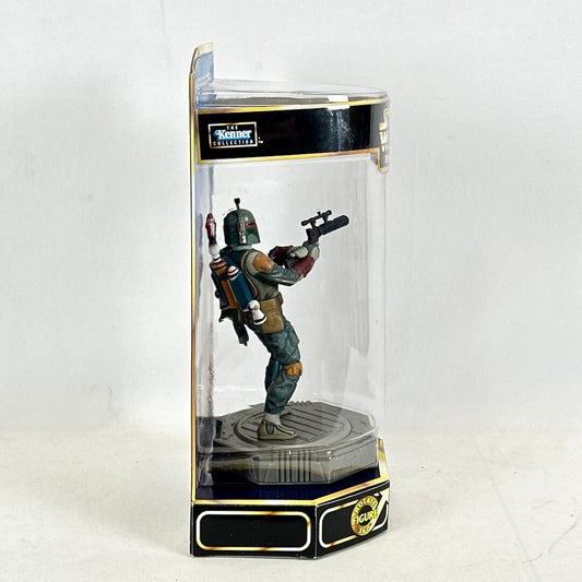 Boba Fett figurine in a transparent display case with Kenner branding on a white background