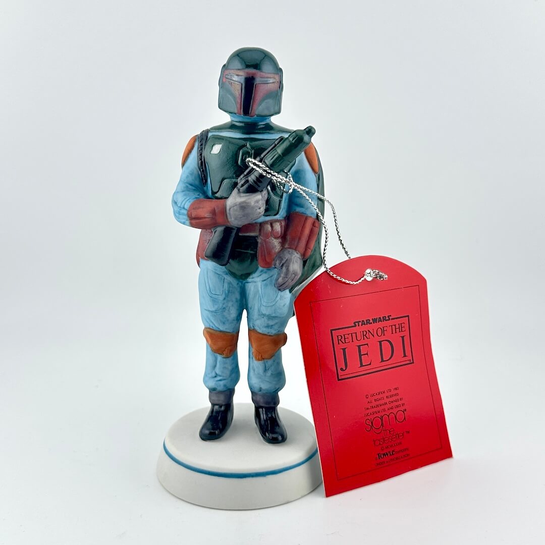 Boba Fett figurine from 'Star Wars' with a red tag on a white background