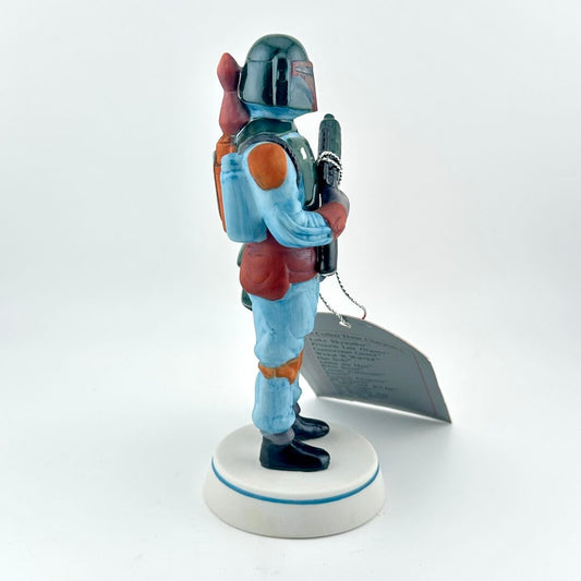 Boba Fett figurine from 'Star Wars' with a red tag on a white background