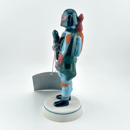 Boba Fett figurine from 'Star Wars' with a red tag on a white background