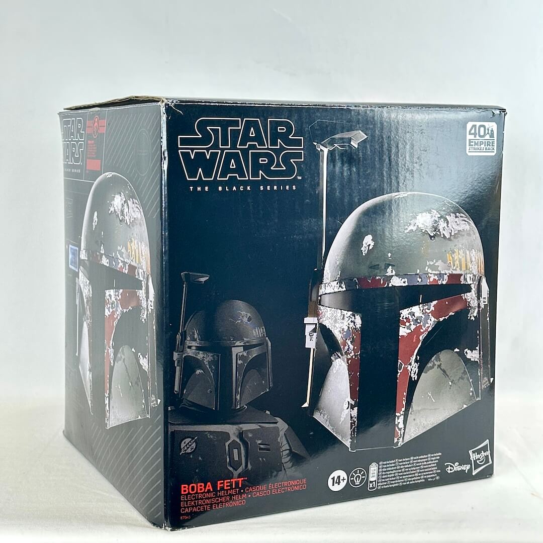 Star Wars The Black Series Boba Fett helmet box, featuring Boba Fett's helmet and figure on a black background.