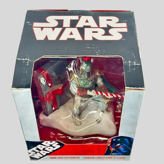 Star Wars Boba Fett action figure in its original window box packaging, featuring a handcrafted figure.