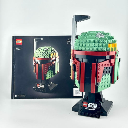 Lego bust of Boba Fett with instruction booklet against white background.