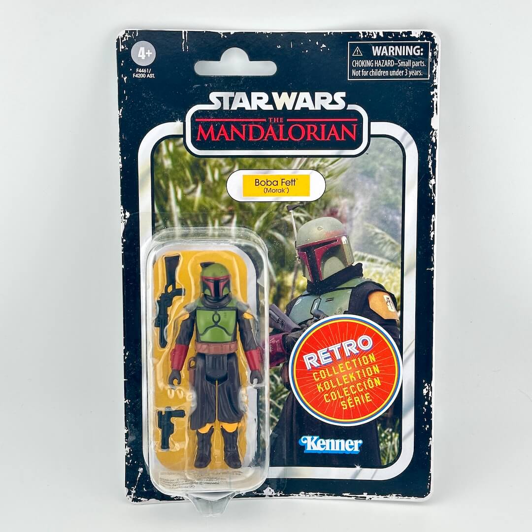 Star Wars The Mandalorian Boba Fett (Morak) action figure in its original retro-style blister card packaging.