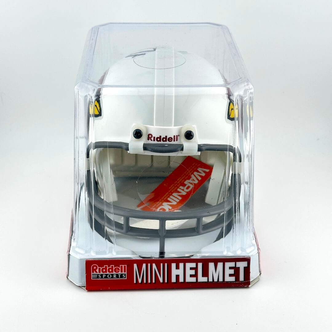 Riddell mini football helmet in clear packaging on a white background