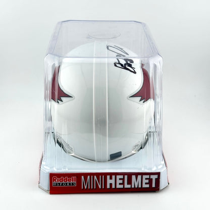 White mini football helmet with red accents in clear packaging on a white background